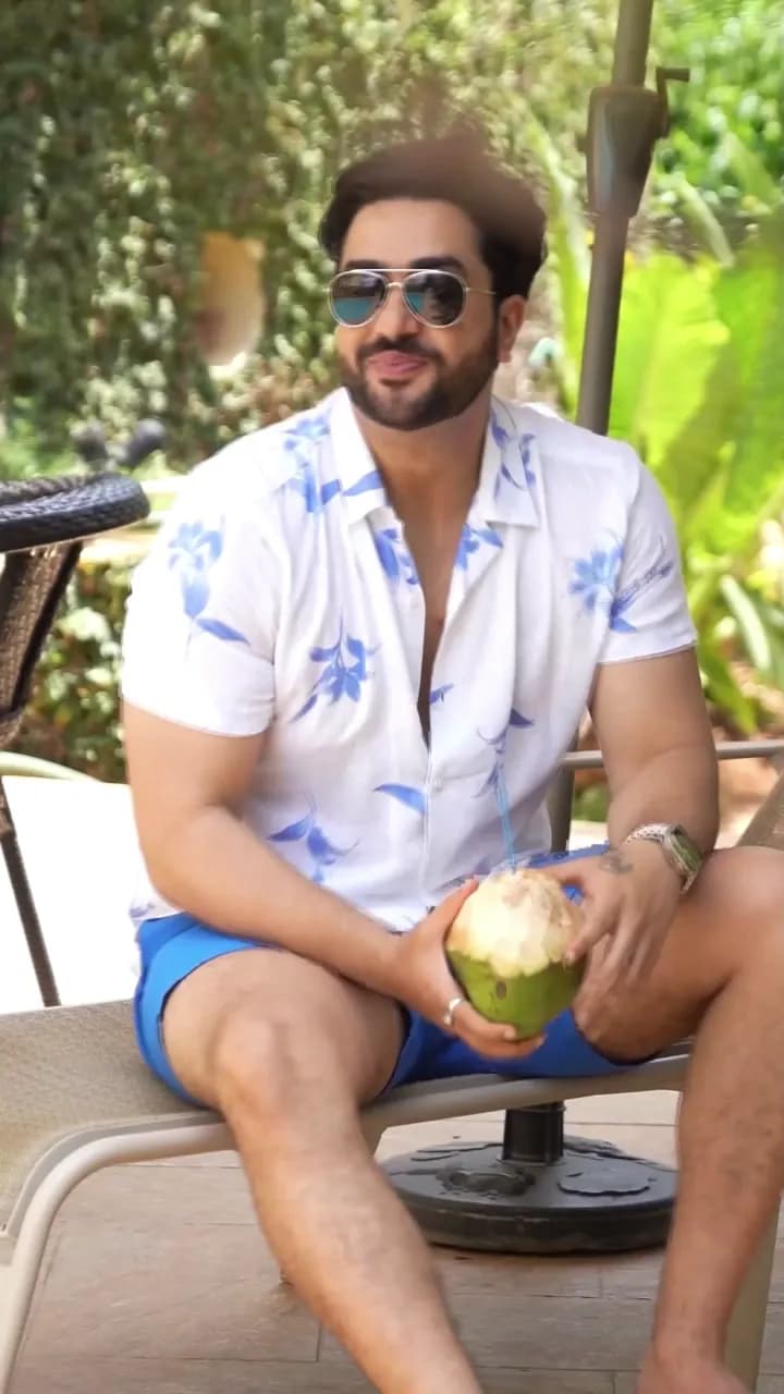 Resort menswear reel: printed shirts styled poolside and in the garden
